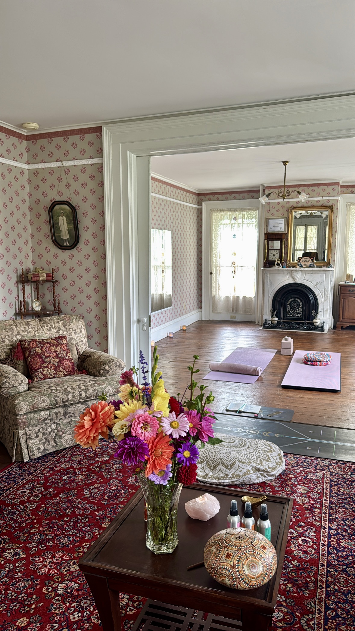 Wild Sol Yoga studio with fresh flowers and mats